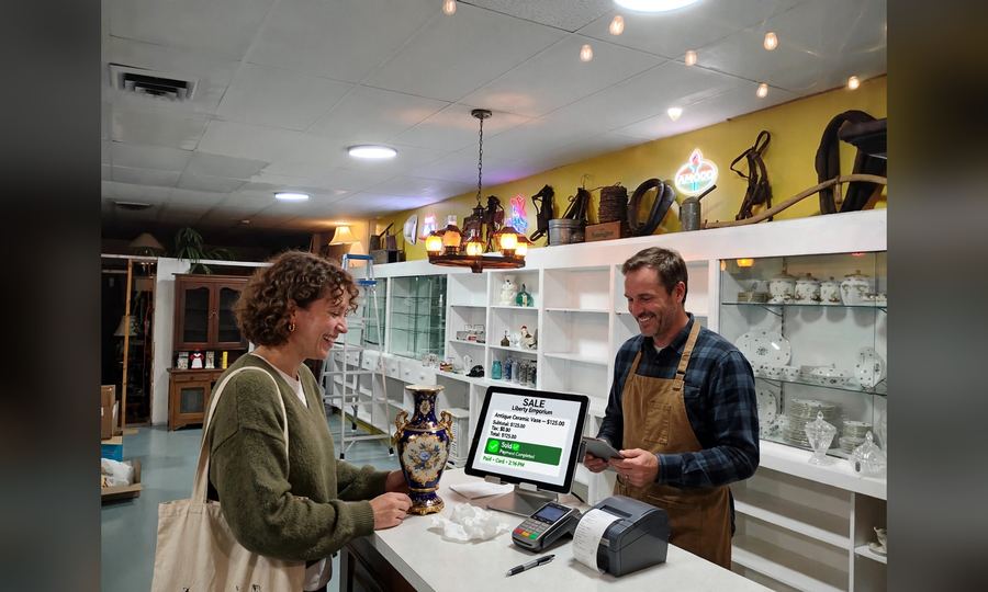 Selling and getting paid — card artwork made from a photo of the Liberty Emporium store.